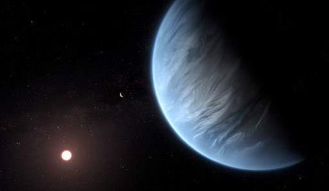 A handout artist's impression released on September 11, 2019, by ESA/Hubble shows the K2-18b super-Earth, the only super-Earth exoplanet known to host both water and temperatures that could support life. | AFP