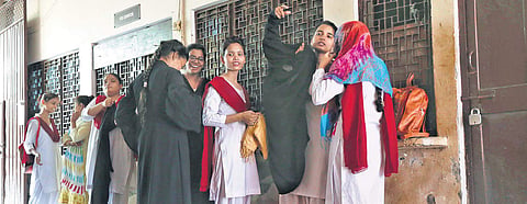 Students at the M G college in Uttar Pradesh’s Firozabad change out of their burqas as they are not allowed to wear them in classrooms. While some colleges have changing rooms, others force them to change in the open  | ( Photo | Arun Kumar )