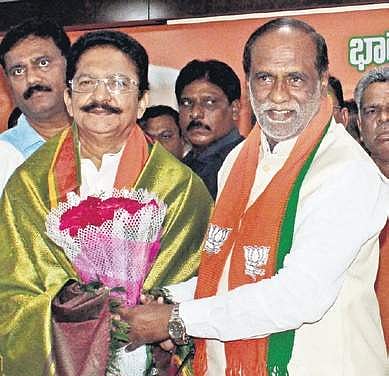BJP State unit president K Laxman  welcomes former Maharashtra Governor  Ch Vidyasagar Rao into the saffron party  in Hyderabad on Monday