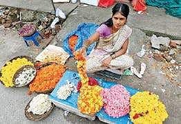 A flower vendor luring customers near Ernakulam North Railway  Station Arun Angela