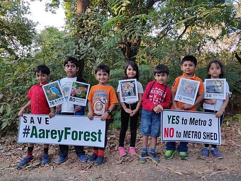 Children protest against the proposed metro project in Mumbai's Aarey Colony which will involve felling of trees. (Photo | Aarey Forest Twitter)