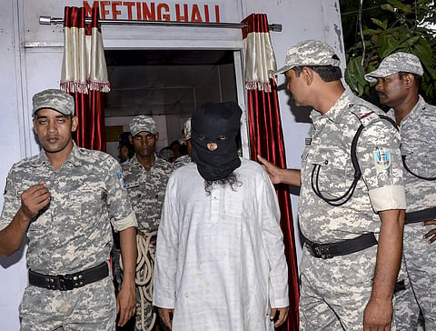Al-Qaeda terrorist Mohammad Kalimuddin Mujahiri arrested by Anti Terrorist Squad ATS from Azad Nagar in Jamshedpur district being taken to a press conference in Ranchi Sunday. (Photo | PTI)