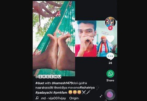 A screenshot of a video uploaded by  @SREENU, along with swear words,  on TikTok app 