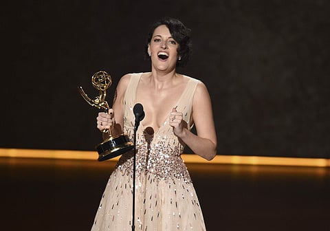 Phoebe Waller-Bridge accepts the award for outstanding writing for a comedy series for 'Fleabag'