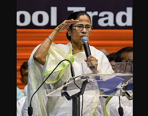 West Bengal Chief Minister Mamata Banerjee addressing the INTTUC rally in Kolkata. (Photo | PTI)