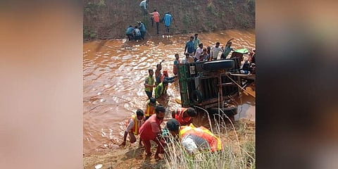 Locals at the accident site where the tractor skid and fell in a canal killing four labourers. (Photo | EPS)