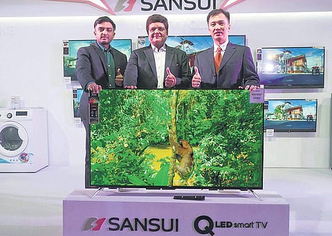 Top executives from Sansui and Jaina Group launch a new range of consumer durable products under the Sansui brand