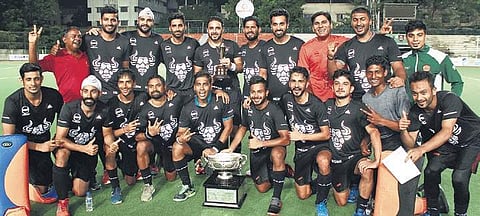 IOC players celebrate after beating Punjab National Bank 3-1 in the final of the  All-India MCC-Murugappa Gold Cup meet on Sunday. (Photo | EPS/d Sampathkumar)