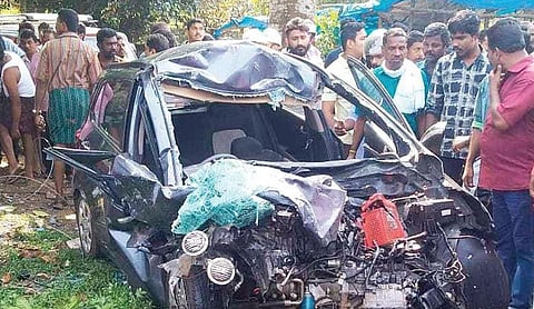 The mangled remains of the car which collided with a KSRTC bus at Cheppad near Kayamkulam, killing three members of a family, on Tuesday | Express