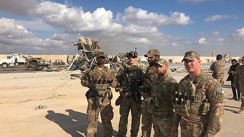 US soldiers stand at the Ain al-Asad air base in Anbar, Iraq 