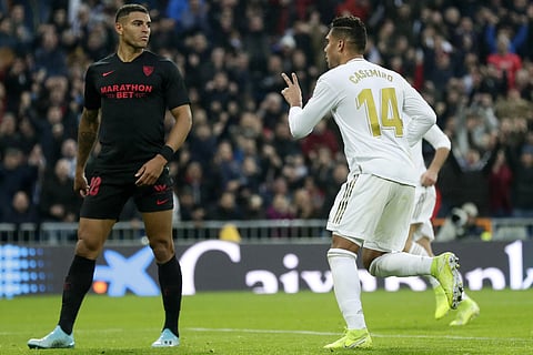 Real Madrid's Casemiro, right, celebrates after scoring his side's second goal during the Spanish La Liga soccer match between Real Madrid and Sevilla at Santiago Bernabeu stadium in Madrid. (Photo | AP)