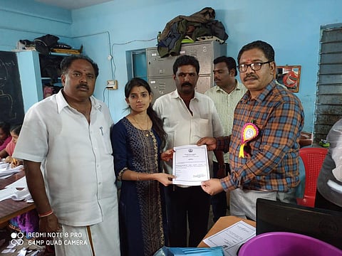 J Sandhiya Rani receiving her certificate of victory on Thursday. (Photo | Express)