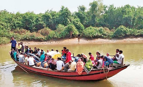 People travelling in a fishing vessel to Hukitola island. (Photo | EPS)