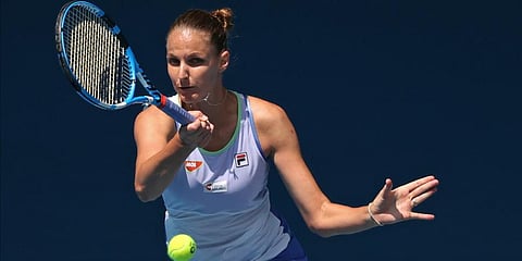 Karolina Pliskova of the Czech Republic makes a forehand return to France's Kristina Mladenovic during their first round singles match at the Australian Open tennis championship in Melbourne. (Photo | AP)