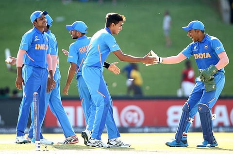Kartik Tyagi celebrates picking a Japanese wicket. (Photo | Twitter @cricketworldcup)