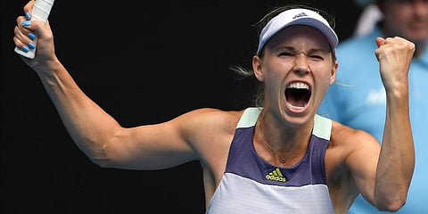 Denmark's Caroline Wozniacki celebrates after defeating Dayana Yastremska of Ukraine in their second round singles match at the Australian Open tennis championship in Melbourne. (Photo | AP)