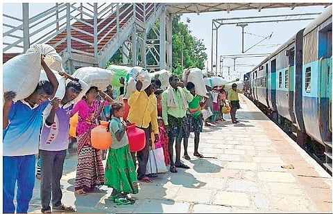 Villagers of Chirthanakal in Kosigi mandal of Kurnool district about to board a Guntur-bound train. (Photo| EPS)