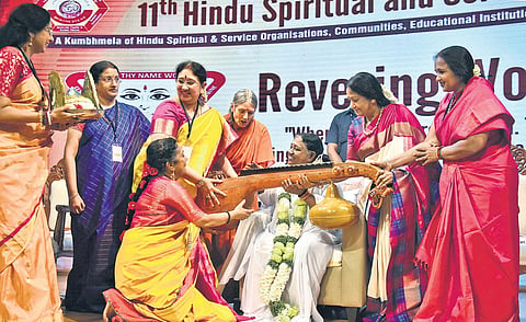 Mata Amritanandamayi being presented a Veena at the inauguration ceremony of the fair in Chennai on Tuesday | P Jawahar