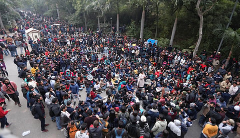 JNU students protesting at main gate campus of the university in New Delhi on Monday. (Photo | Arun Kumar P/EPS)