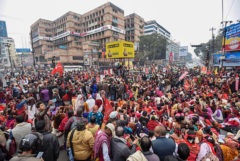 Left parties supporters block the traffic on the Dak Bangalow road in support of the nationwide strike called by ten trade unions in protest against the alleged anti-people policies of the Centre in Patna Wednesday Jan. 8 2020. (Photo | PTI) 