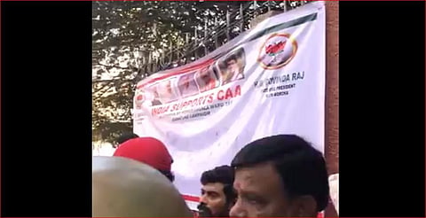 A poster 'India Supports CAA' on the wall of Jyothi Nivas College near Koramangala. (Photo | Twitter screengrab)