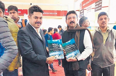 Author Raj Padhiyar (left) and Union HRD Minister Ramesh Pokhriyal