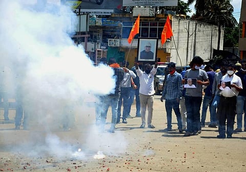BJP activists celebrate after the verdict on Babri mosque demolition case by the special CBI court in Chikmagalur Wednesday Sept. 30 2020. (Photo | PTI)