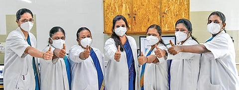 Senior doctors of the microbiology team celebrate the successful completion of 1.7 lakh Covid sample tests at their laboratory in KAP Viswanatham Government Medical College on Thursday | MK Ashok Kuma
