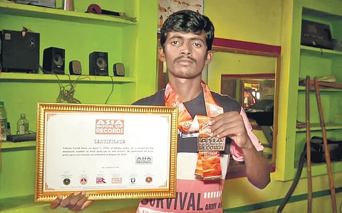 Tukuna Turuk with his Asia Book of Records certificate I Express