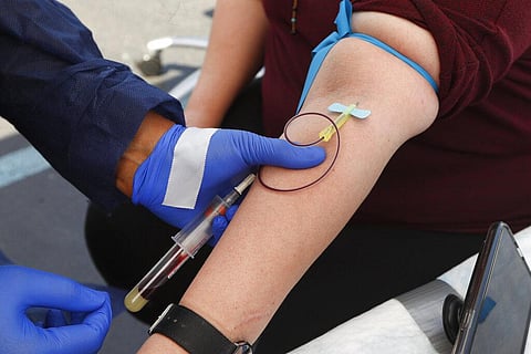 A woman has blood drawn for COVID-19 antibody testing. (File photo | AP)