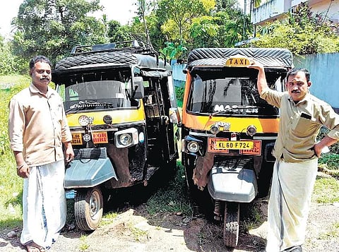 Harish Karuvachery (left) and Mayil Ratheesh with their autorickshaws. More than fear, it is ignorance of Covid-19 that is preventing other auto drivers from taking patients to hospitals, they say
