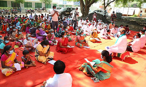 DMK MLA EV Velu chairing a grama sabha meeting at Nachananthal village in Tiruvannamalai  (Photos by Special Arrangement)