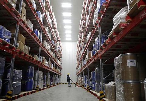 A worker moves boxes at Snowman Logistics, India's largest cold storage company in Taloja, on the outskirts of Mumbai, India, Saturday, Oct. 17, 2020. (Photo | AP)