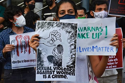 DYFI members during a protest rally demanding justice for the Hathras victim outside the gate of IIT Powai in Mumbai Friday Oct. 2 2020. (Photo | PTI)
