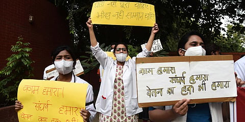Resident doctors of Hindu Rao Hospital protest against non-payment of salaries in New Delhi. (Photo| Parveen Negi, EPS)