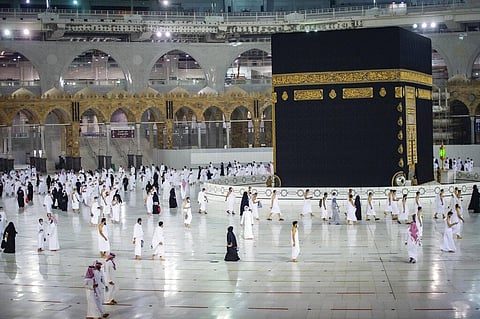 In this photo released by Saudi Ministry of Hajj and Umrah, Muslims pray around the Kaaba during the first day of Umrah in Mecca, Saudi. (Photo | AP)