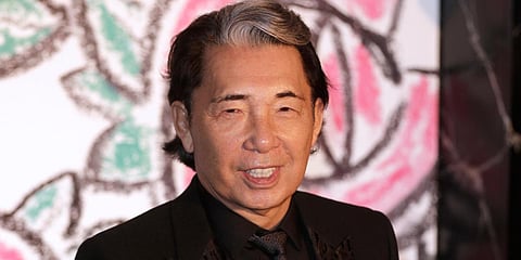 Japanese fashion designer Takada Kenzo poses for photographers as he arrives at the Rose Ball in Monaco. (File photo| AP)
