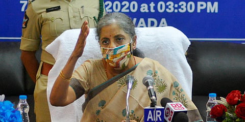 Finance Minister Nirmala Sitharaman addresses a press conference on Empowerment of Farmers at Income Tax Office in Vijayawada. (Photo| PTI)