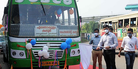 Kochi Metropolitan Transport Authority  CEO Jafar Malik flagging off the first  smart bus functioning on CNG fuel at  Vyttila Mobility Hub. (Photo| A Sanesh, EPS)