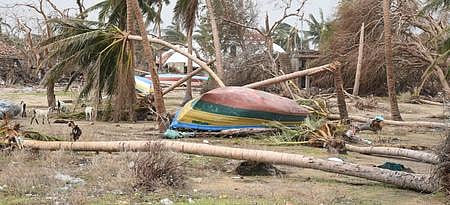 A fiberglass boat reminds us of the destruction Cyclone Gaja left behind on the fateful day at Vizhunthamavadi Village in Nagapattinam. 