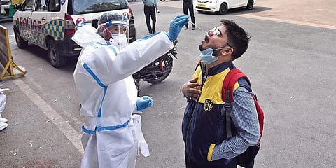 A commuter undergoes test in Noida on Wednesday. (Photo | Parveen Negi, EPS)