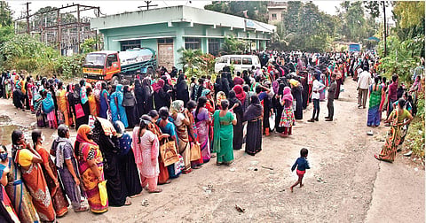 People wait in long queues in front of a Mee Seva Centre at Musheerabad on Wednesday | VINAY MADAPU