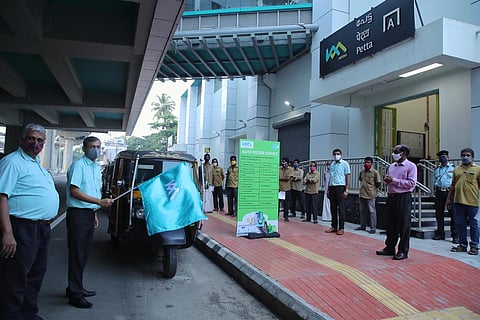 D K Sinha, Director (Systems), KMRL, flagging off the first feeder autorickshaw from the Petta station on Friday.