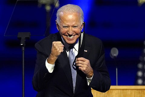 President-elect Joe Biden gestures to supporters Saturday, Nov. 7, 2020. (Photo | AP)