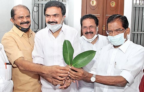 KC(M) leader Jose K Mani, Thomas Chazhikadan, MP, and others celebrating the HC order allotting the ‘Two Leaves’ symbol to them, at the party state committee office in Kottayam on Friday| Vishnu Prath