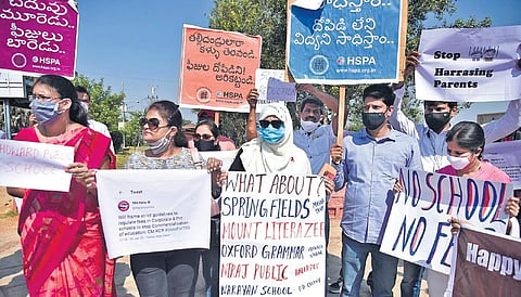 Members of Hyderabad School Parents Association stage a silent protest, demanding that the State government take action against schools violating  GO 46  |RVK Rao