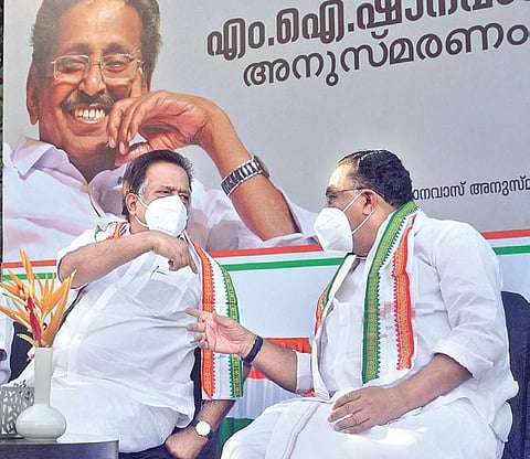 Opposition leader Ramesh Chennithala and UDF convener M M Hassan sharing a light moment  at the M I Shanavas  memorial meeting in T’Puram on Saturday |  Vincent Pulickal