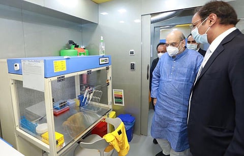 Union Home Minister Amit Shah on Monday launched a mobile laboratory that will conduct free RT-PCR tests for COVID-19 (Photo | @amitshah Twitter)