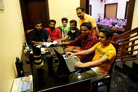 Young members of the CPM's cyber wing of Muliyar panchayat create social media content for LDF candidates from the house of Anil Bepu at Iriyanni. (Photo | Express)