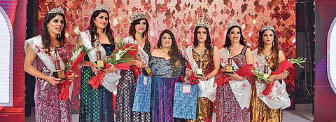 Winners of Mrs Delhi-NCR 2020 Aakriti Hooda and Meghana Puri on either side of (centre) Barkha Nangia, Director of Glamour Gurgaon, organiser of the beauty show